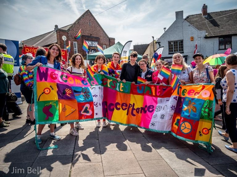 Young people with banner